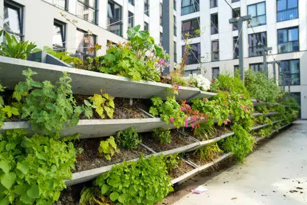 A vertical farm with stacked layers of crops in an urban setting - Urban farming - Agristuff